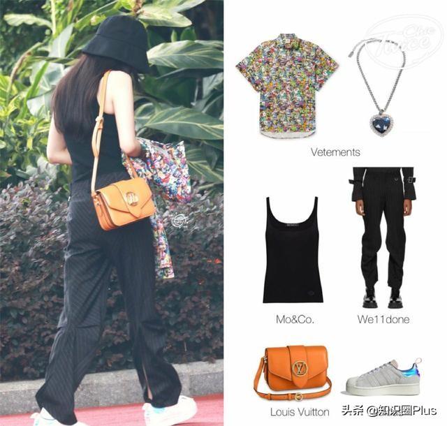 杨幂海洋之心项链搭配渔夫帽+黑色背心，一身