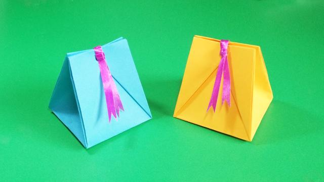 怎么用一张纸折袋子(怎么用一张纸折成包装袋)