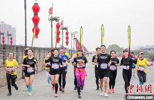 西安城墙国际马拉松多城“联动”内地体育赛事渐“回暖”