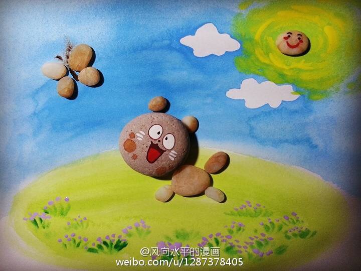 青岛网友用石头创作欢乐迎猴年