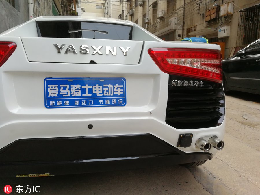 新能源车标撞脸奥迪 网友：你比四环多一环