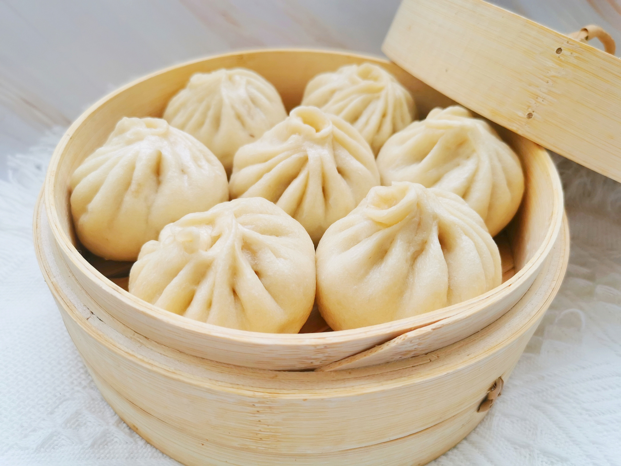 13块钱猪肉，3块钱面粉，做了28个小笼包，一周的早餐就有了