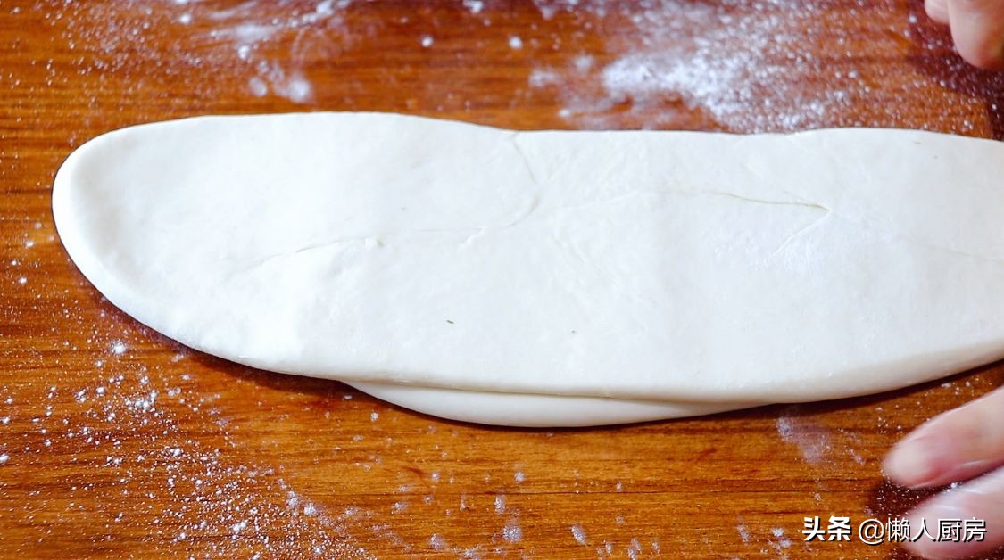 過年做這道小吃，包滿花生餡，寓意錢包滿，是招待客人必備的食品