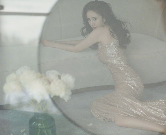 杨幂:爬上顶峰的背后是努力 努力就是她隐形的翅膀
