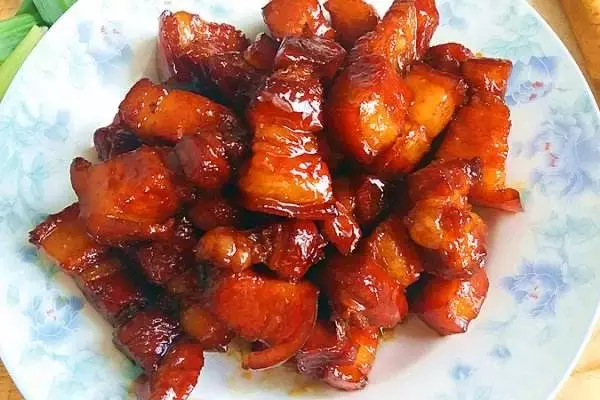 When making pork of braise in soy sauce, should fry candy color alone? 