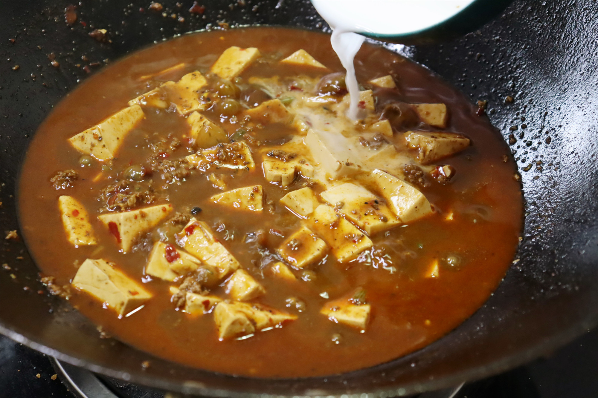 Eating tofu and rice. My family only loves this one. I don’t bother to eat 7 meals a week. The rice has to be steamed in a big pot.