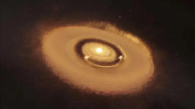 370光年外，一个新“太阳系”正在一片烟尘中孕育-第2张图片-IT新视野