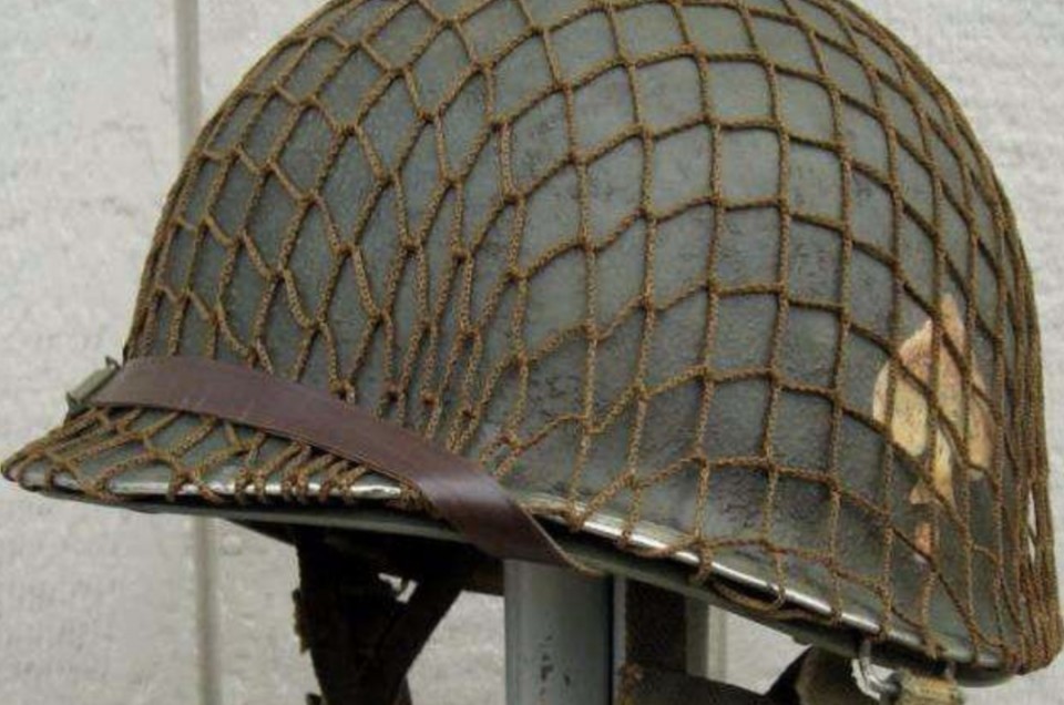 钢盔上为什么要用张网包裹住？不是为了美观，