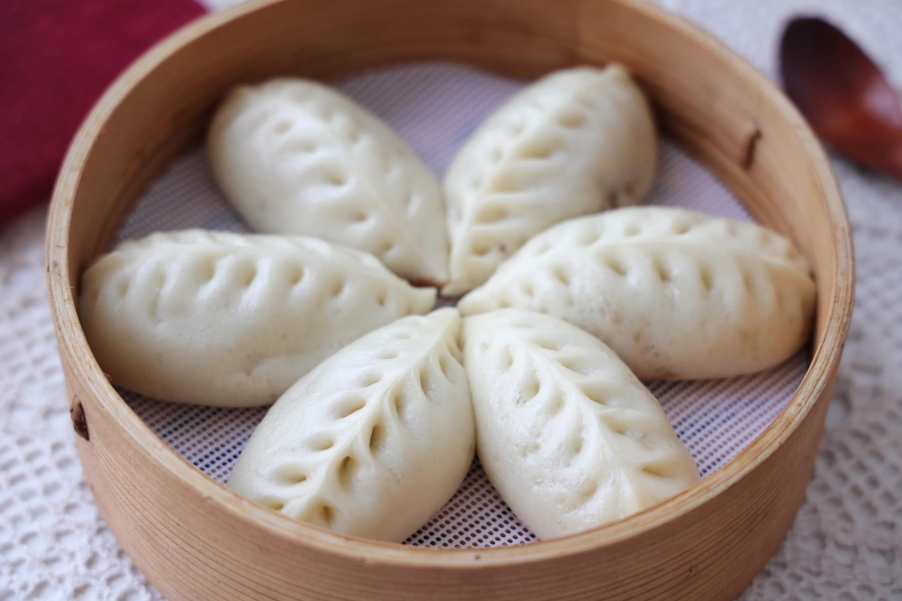 孩子要吃包子，一口氣在家做了20多個，個個鬆軟流湯汁，太好吃了